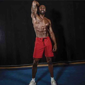 Julius DeAndre Harris showing his tattoos on his right arm